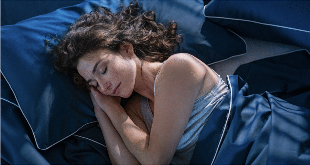 lady sleeping peacefully in bed